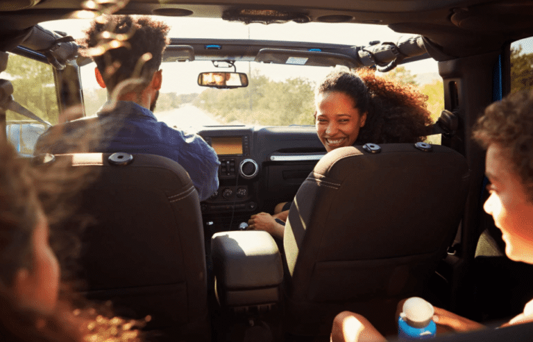 Family in the car during a summer road trip